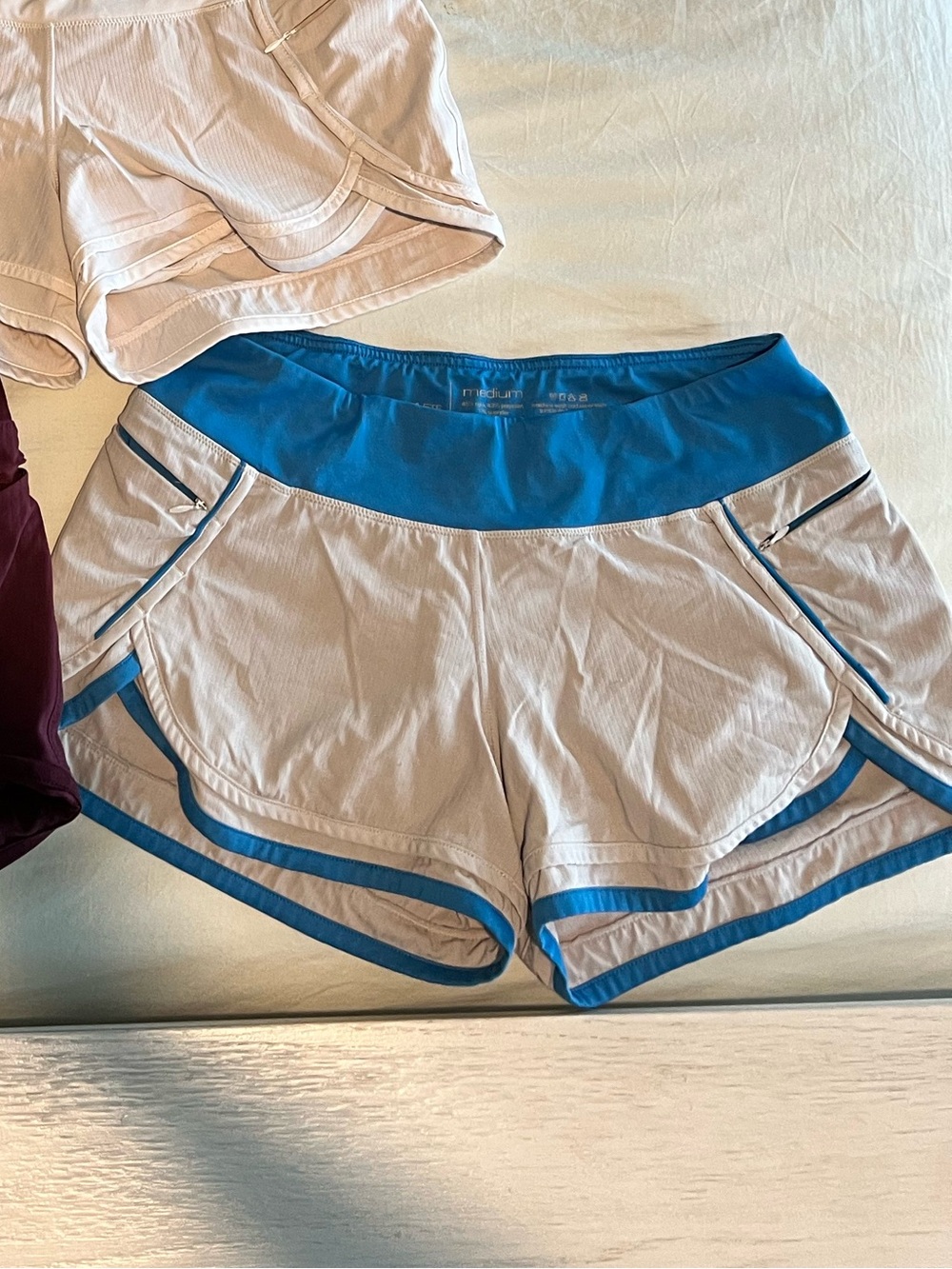 Hylete Women’s Athletic Shorts bundle - White, Maroon & White/Blue - size Medium - Picture 4 of 5